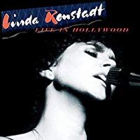 リンダ・ロンシュタットのキャリア初となるライヴ・アルバム「ライヴ・イン・ハリウッド」が遂にリリース！１９８０年４月２４日に米ＴＶ局ＨＢＯの特別番組用にハリウッドで収録されたスタジオ・ライヴより、９曲の未発表音源を含む、リンダ自身が選んだ全１２曲を収録！アナログ盤も同時入荷です！